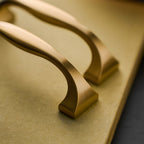 Modern Brass Bow Drawer Handles with Wide Square Feet